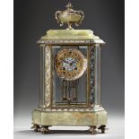 A FRENCH BRONZE AND CHAMPLEVÉ ENAMEL MANTEL CLOCK, 19TH CENTURY