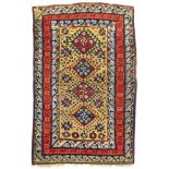 A RARE CAUCASIAN YELLOW GROUND KUBA RUG, MID 19TH CENTURY