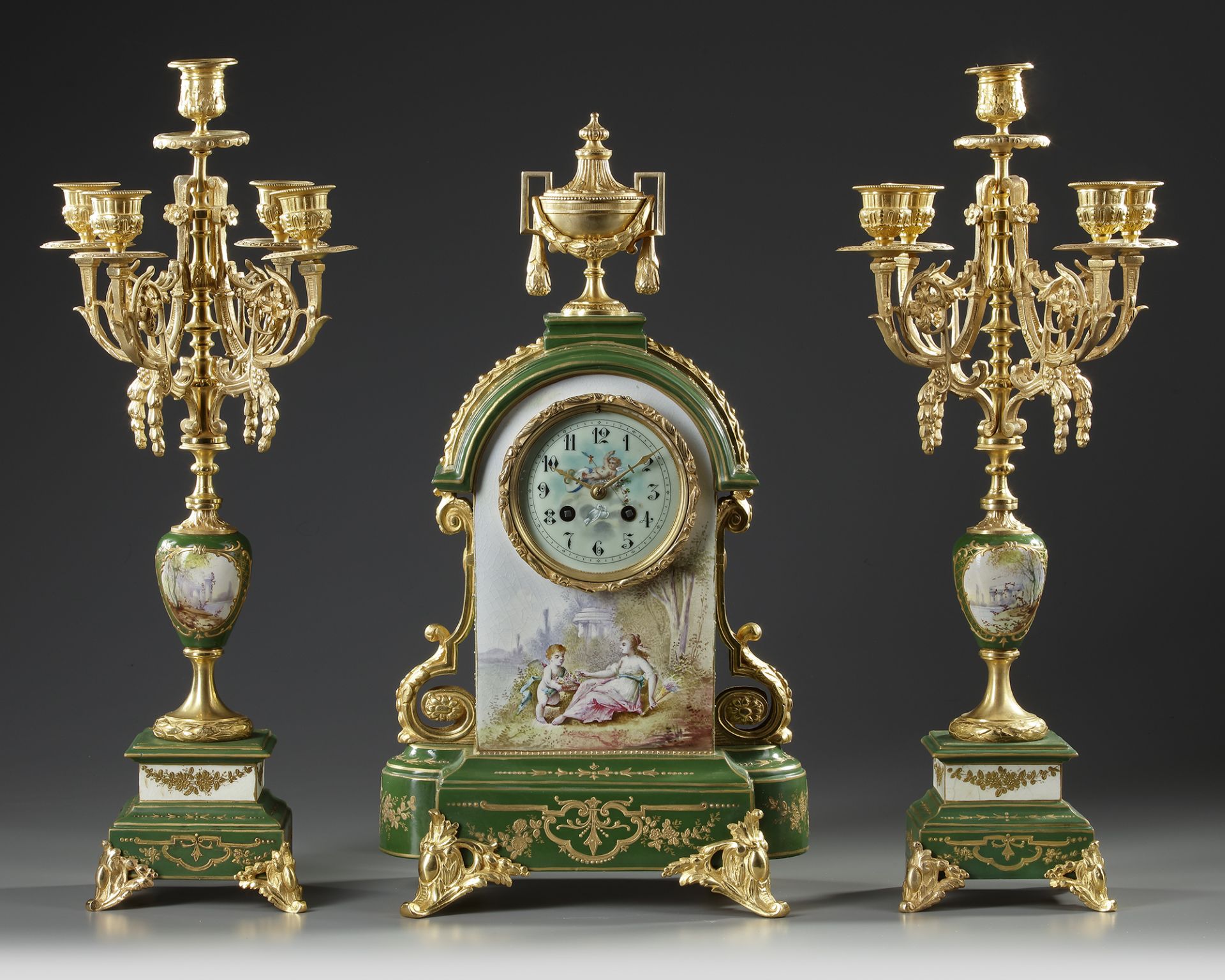 A FRENCH GILT BRONZE CLOCK SET, 19TH CENTURY