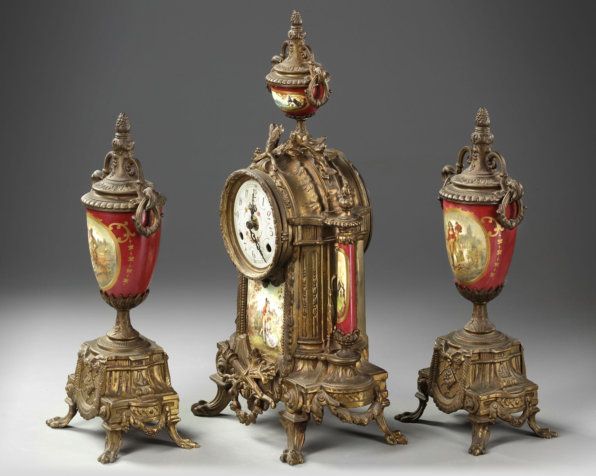 A SPELTER AND RED PORCELAIN CLOCK SET, 19TH CENTURY - Image 2 of 4