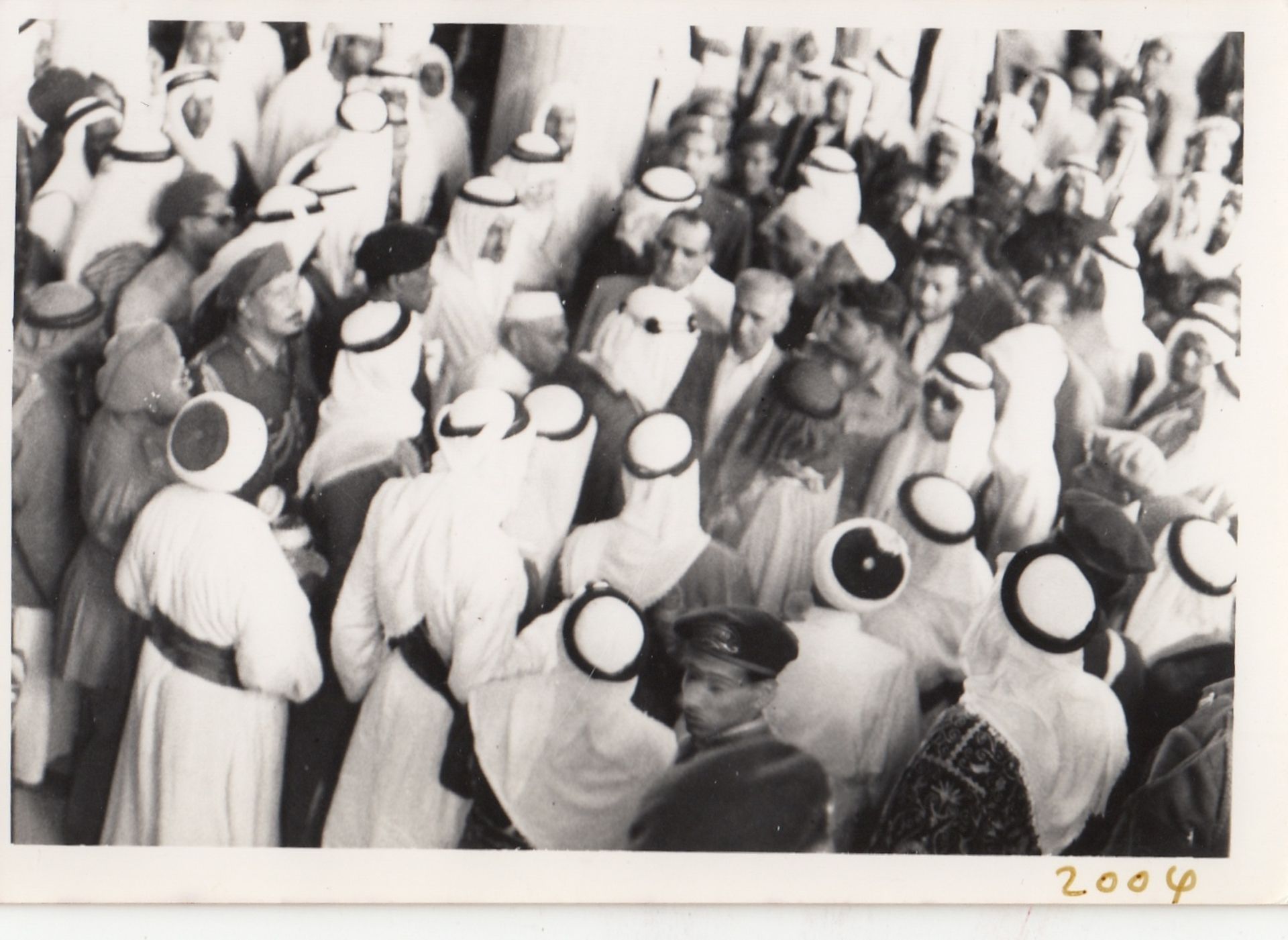 A COLLECTION OF PHOTOGRAPHS OF HIS MAJESTY KING FAISAL BIN ABDUL AZIZ VISITING THE GRAND MOSQUES OF - Image 12 of 24