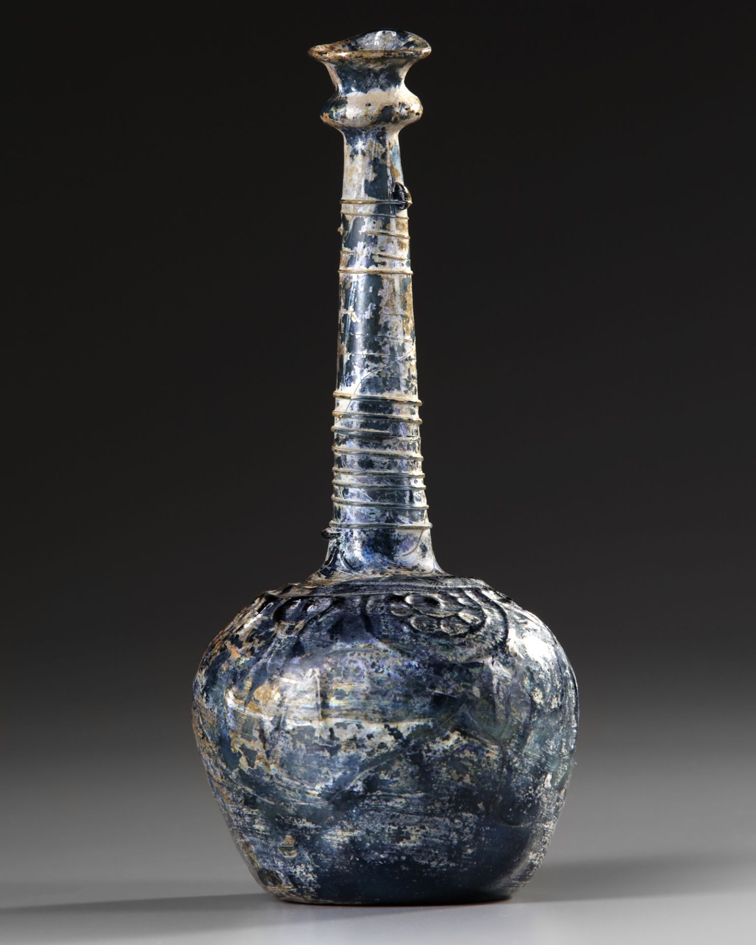 A TALL-NECKED BLUE GLASS BOTTLE, PERSIA OR SYRIA, 11TH-12TH CENTURY - Image 3 of 7