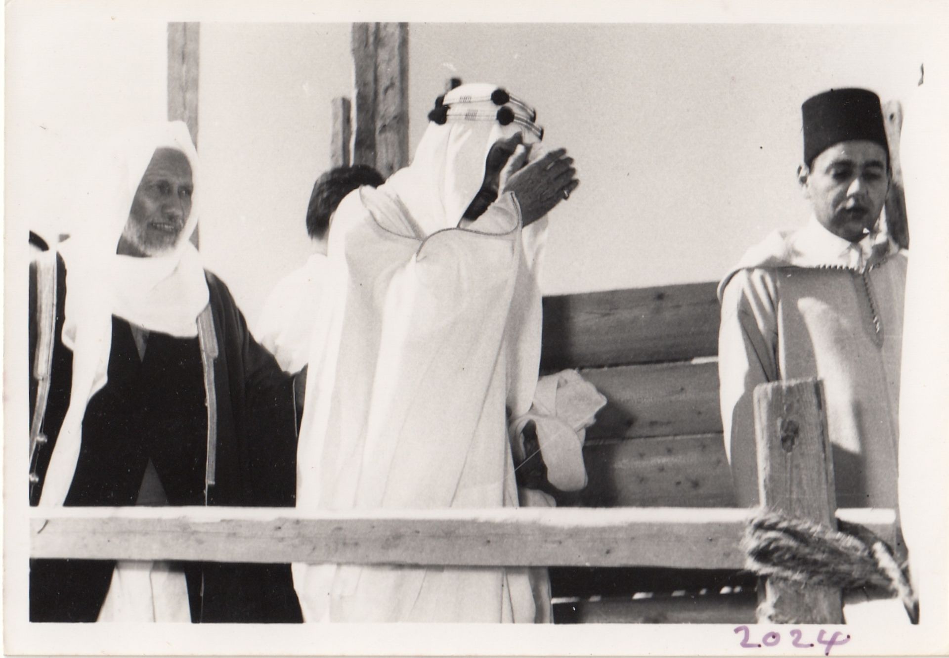 A COLLECTION OF PHOTOGRAPHS OF HIS MAJESTY KING FAISAL BIN ABDUL AZIZ VISITING THE GRAND MOSQUES OF