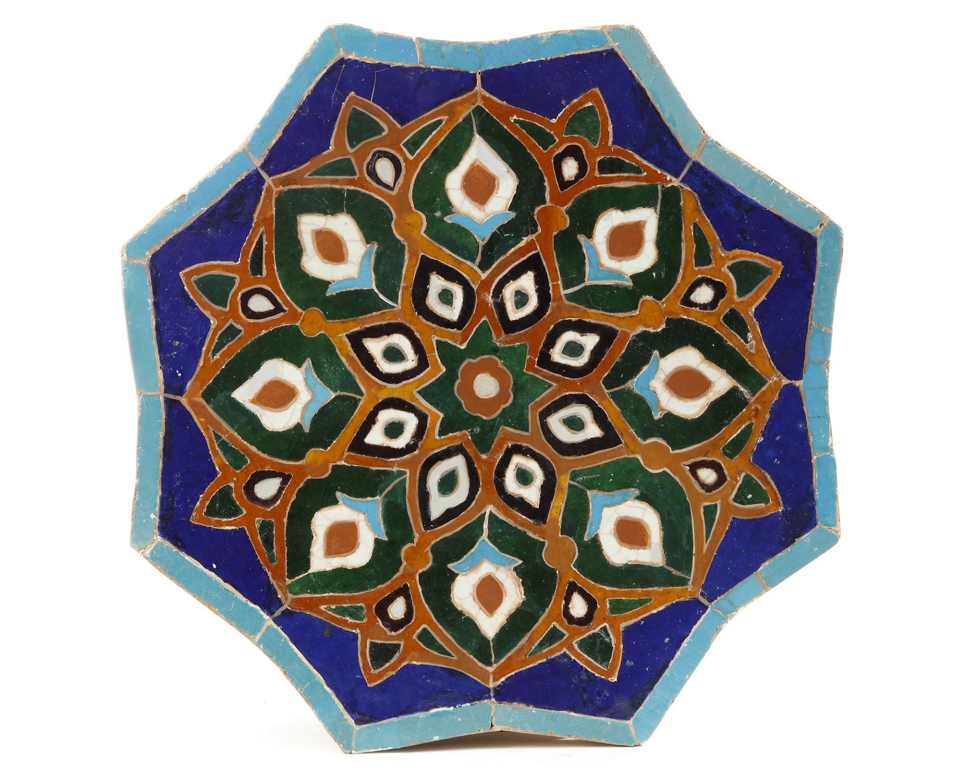 A LARGE TIMURID CUERDA-SECA STAR TILE, PERSIA, 15TH CENTURY