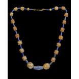 A FATIMID BEADED GOLD NECKLACE, LAPIS-LAZULI, 11TH-13TH CENTURY