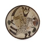 A NISHAPUR FIGURAL BUFFWARE POTTERY BOWL DEPICTING A WARRIOR, PERSIA, 10TH CENTURY