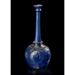 A LARGE MOULD-BLOWN BLUE GLASS BOTTLE-VASE OR SPRINKLER, PERSIA, 12TH CENTURY