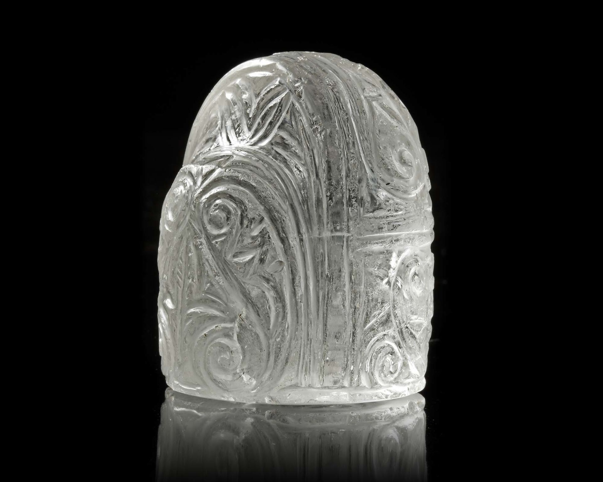 A KING (SHAH) ROCK CRYSTAL CHESS PIECE, IRAQ OR KHORASAN, LATE 9TH-EARLY 10TH CENTURY