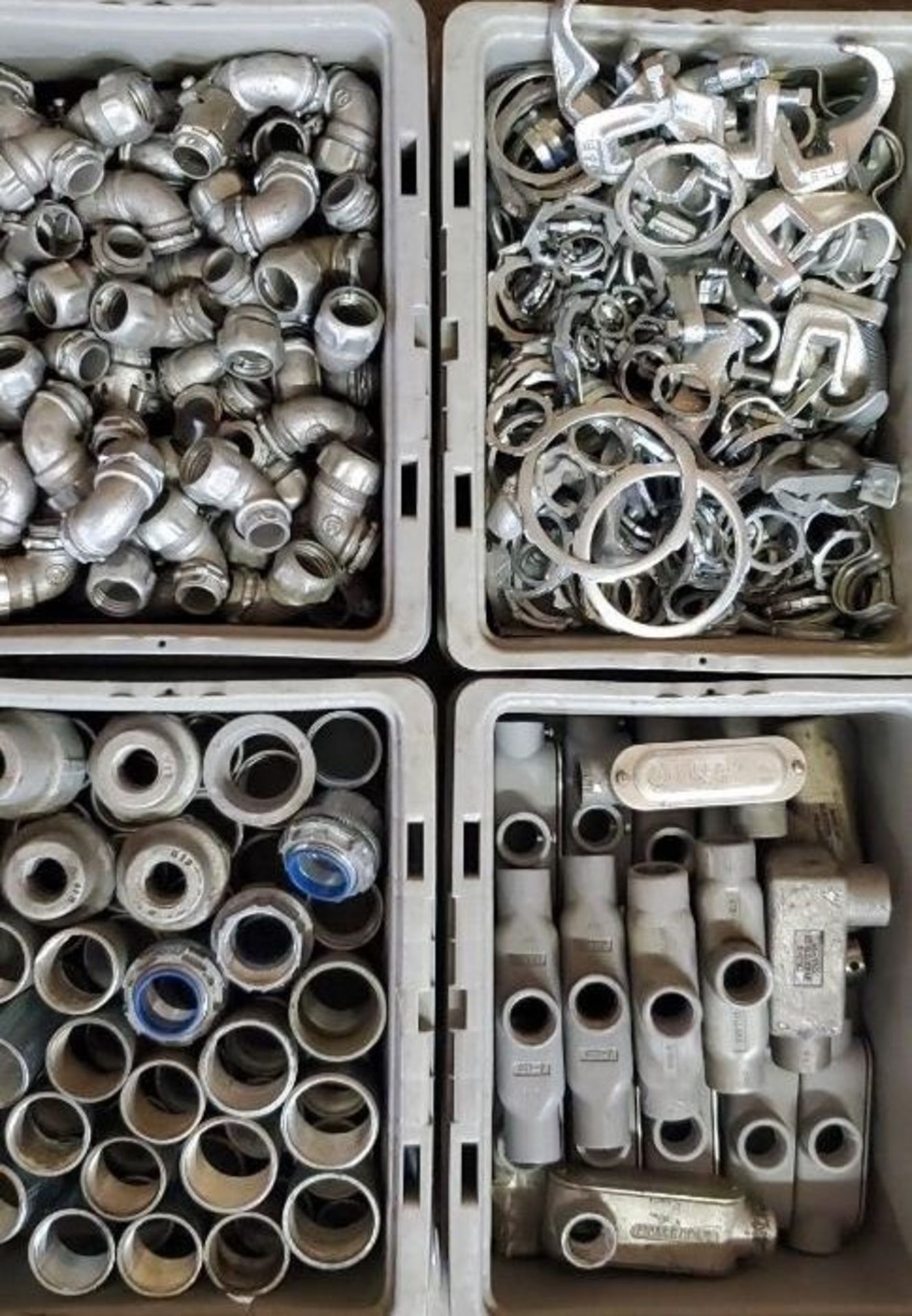 (4)Trays of Conduit Connectors, Pipe Clamps & Nuts