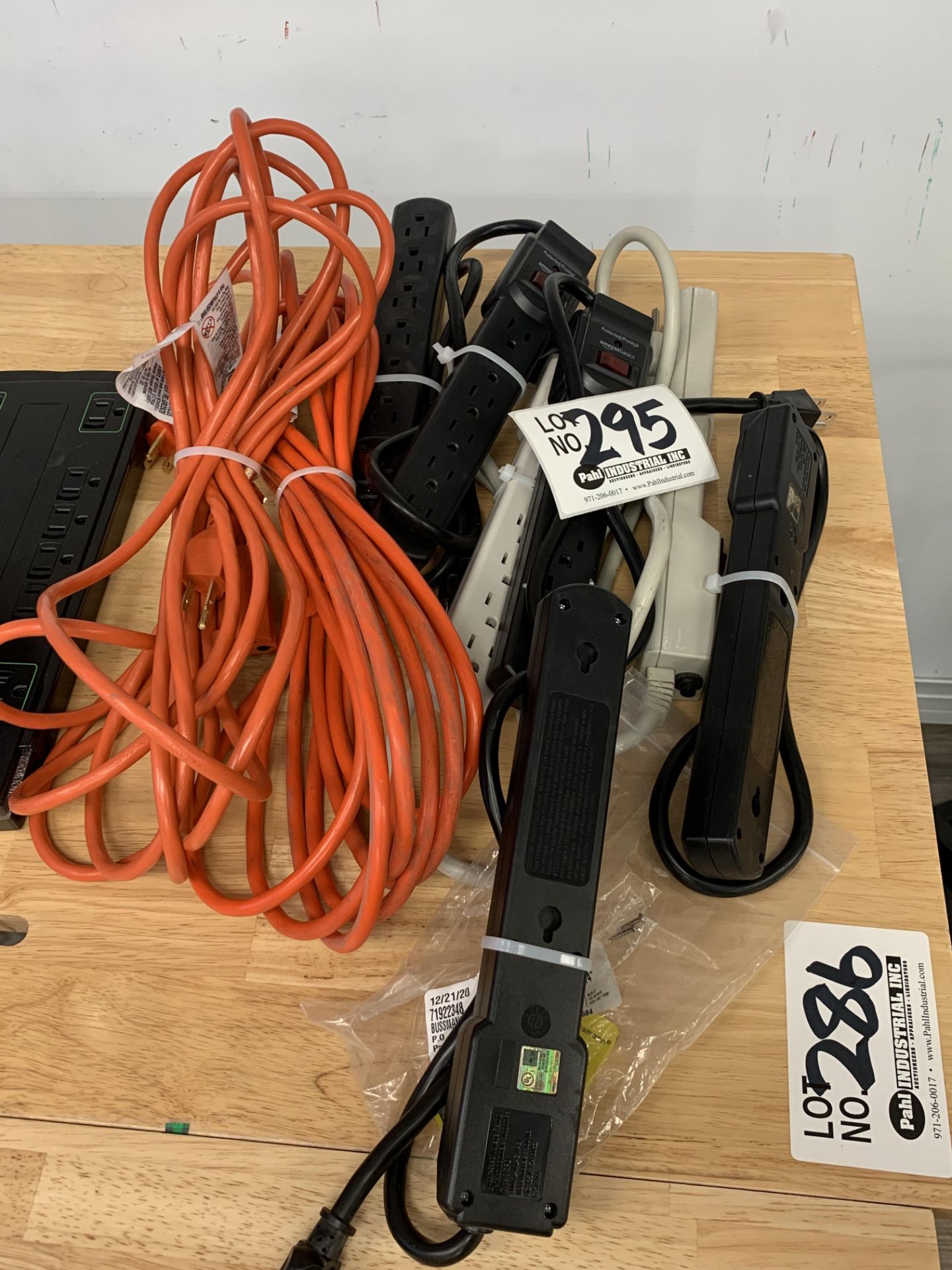 Assorted extension cords and surge protectors