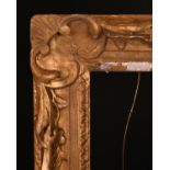 18th Century English School. A partially Carved Giltwood Frame, with swept and pierced centres and