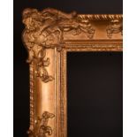 20th Century English School. A Louis Style Gilt Composition Frame, with swept centres and corners,