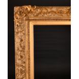 19th Century English School. A Gilt Composition Frame, with swept corners, rebate 50” x 40” (127 x