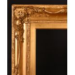 19th Century English School. A Gilt Composition Frame with swept centres and corners, rebate 18" x