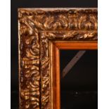 20th Century Italian School. A Gilt and Painted Composition Frame, rebate 35.75” x 23” (90.8 x 58.