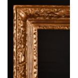 18th Century English School. A Carved Giltwood Frame, with Lely Panels, rebate 30” x 25” (76.2 x