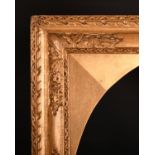 Early 19th Century English School. A Carved Giltwood Frame, with Lely panels and inset oval slip,