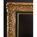 20th Century English School. A Gilt Composition Frame with swept centres and corners and fabric