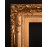 19th Century English School. A Gilt Composition Frame, with swept centres and corners, rebate 30”