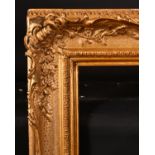 19th Century English School. A Gilt Composition Frame, with swept centres and corners, rebate 30.