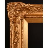 19th Century English School. A Gilt Composition Frame with swept centres and corners, rebate 13.