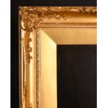 19th Century English School. A Gilt Composition Frame with swept centres and corners and inset