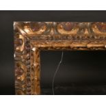 19th Century Italian School. A Gilt and Painted Composition Frame, rebate 43.25” x 38” (110 x 96.