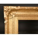 19th Century European School. A Gilt Composition Frame, with swept centres and corners, rebate 38” x