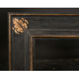 20th Century Italian School. A Gilt and Black Painted Plate Frame, rebate 36” x 29.5” (91.5 x 75cm)
