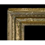 18th Century English School. An Important Carved Giltwood Carlo Maratta Frame, rebate 96.5” x 74” (