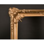 19th Century European School. A Gilt Composition Frame, with ornate corners, rebate 34” x 28.5” (