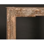 Late 18th Century English School. A Carved Giltwood Frame, with Swept Centres and Corners, rebate