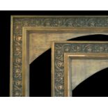 Early 20th Century Italian School. A Pair of Gilt and Painted Plate Frames, with arched slip, rebate