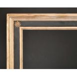 19th Century English School. A Gilt and Black Painted Frame, with corner rosettes, rebate 32.5” x