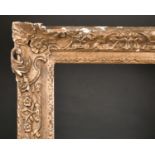 19th Century English School. A Carved Giltwood Frame, with swept and pierced corners, rebate 30” x