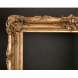 19th Century European School. An Elaborate Gilt Composition Frame, with swept and pierced centres