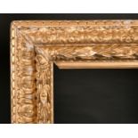 18th Century Italian School. A Carved Giltwood Frame, rebate 47.5” x 36” (120.7 x 91.5cm)