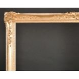 20th Century English School. A Gilt Composition Frame, with swept centres and corners, rebate 34.25”