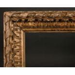 19th Century European School. A Carved Giltwood Frame, rebate 40” x 38.5” (101.6 x 97.8cm)