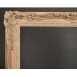 20th Century English School. A Gilt Composition Frame, with swept and pierced centres and corners,