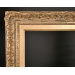 20th Century English School. A Gilt Composition Frame, with swept centres and corners, rebate 28”