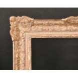 20th Century English School. A Gilt Composition Louis Style Frame, with swept centres and corners,