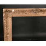 20th Century English School. A Gilt Composition Frame, with swept centres and corners, rebate 48”