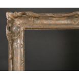 19th Century English School. A Carved Wood Frame, with swept centres and corners, rebate 30" x