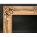 19th Century English School. A Gilt Composition Frame, with swept and pierced centres and corners,