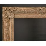 20th Century English School. A Gilt Composition Frame, with swept centres and corners, rebate 30”