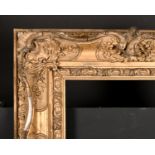 19th Century English School. A Gilt Composition Frame, with swept centres and corners, rebate 17.