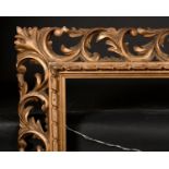 19th Century Italian School. A Carved Giltwood Florentine Frame, rebate 31" x 28" (78.7 x 71.2cm)