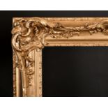 19th Century English School. A Gilt Composition Frame, with swept and pierced centres and corners,