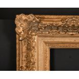 19th Century French School. A Gilt Composition Louis Style Frame, rebate 10" x 8" (25.4 x 20.2cm)